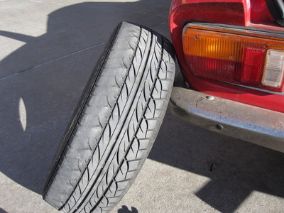 Tire looking too dodgy to use.jpg and 